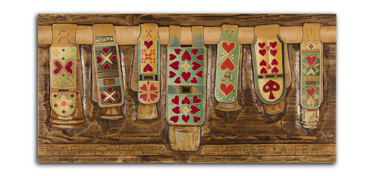 peinture et gravure sur bois d'une collection de colliers de brebis