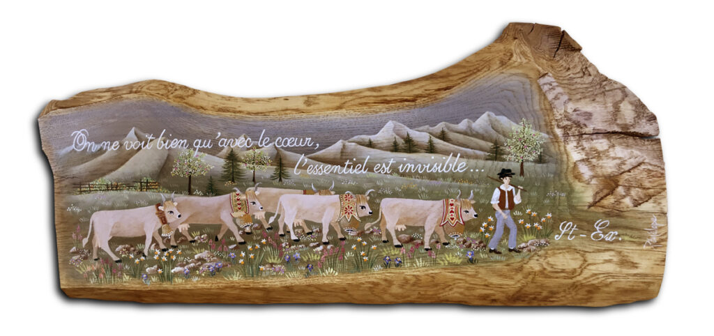 peinture acrylique sur chêne, poya de vaches blondes, avec la phrase de saint-exupéry “on ne voit bien qu'avec le cœur”